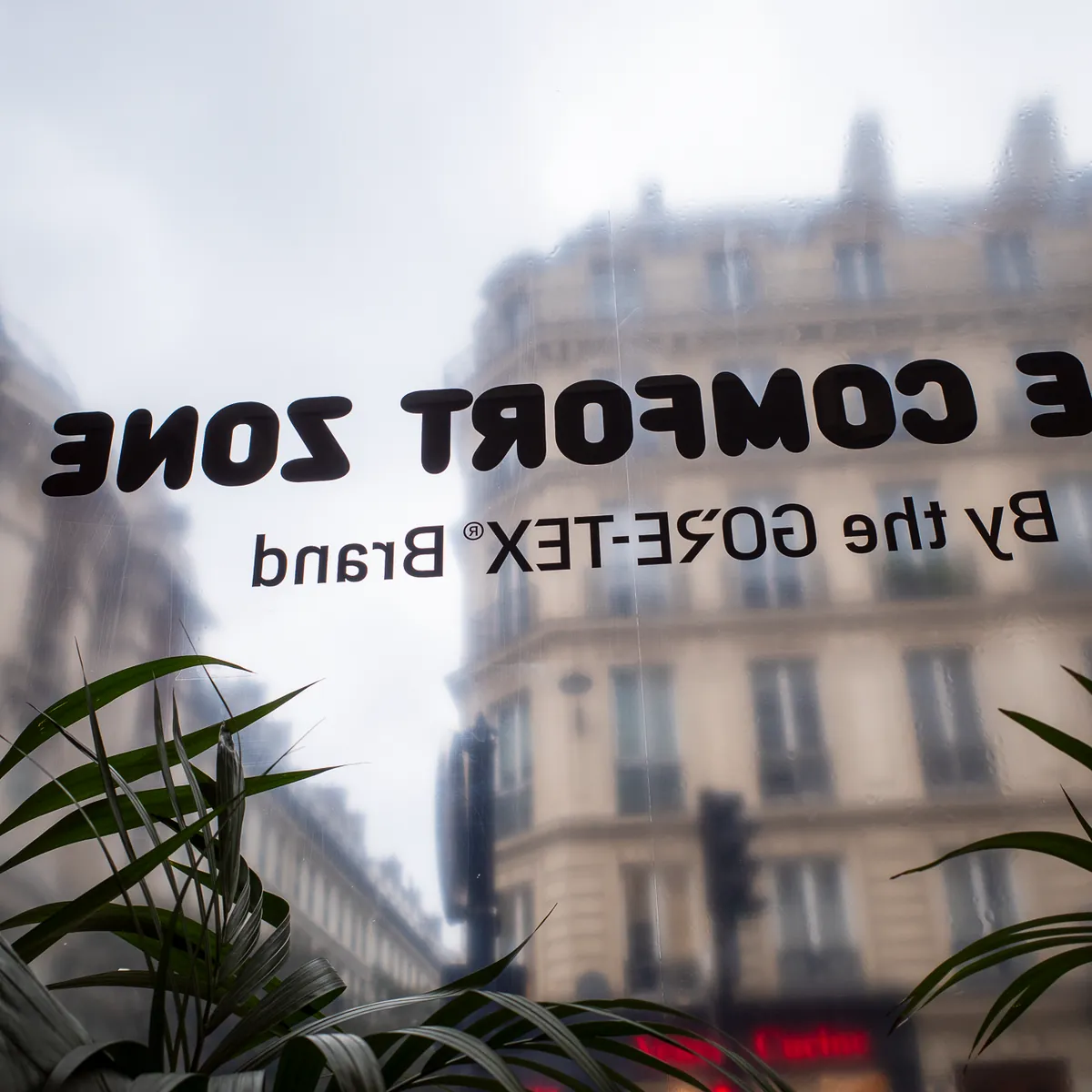 The Comfort Zone by the Gore-Tex Brand, lettered on a window above a Paris street.